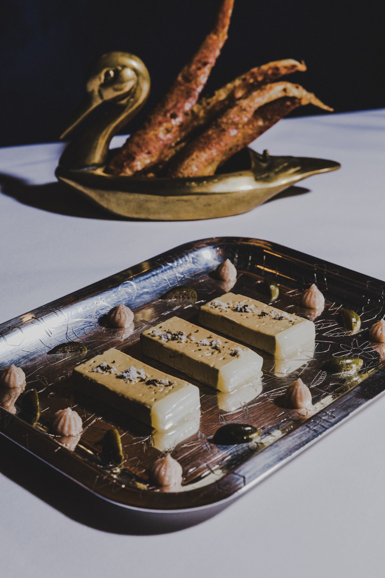 Foie gras terrine on a silver tray